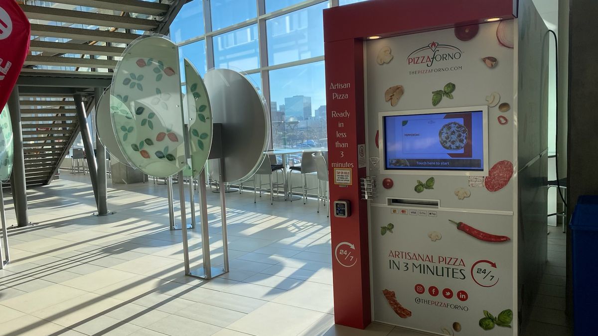 A PizzaForno indoor kiosk that is located inside MacEwan University.