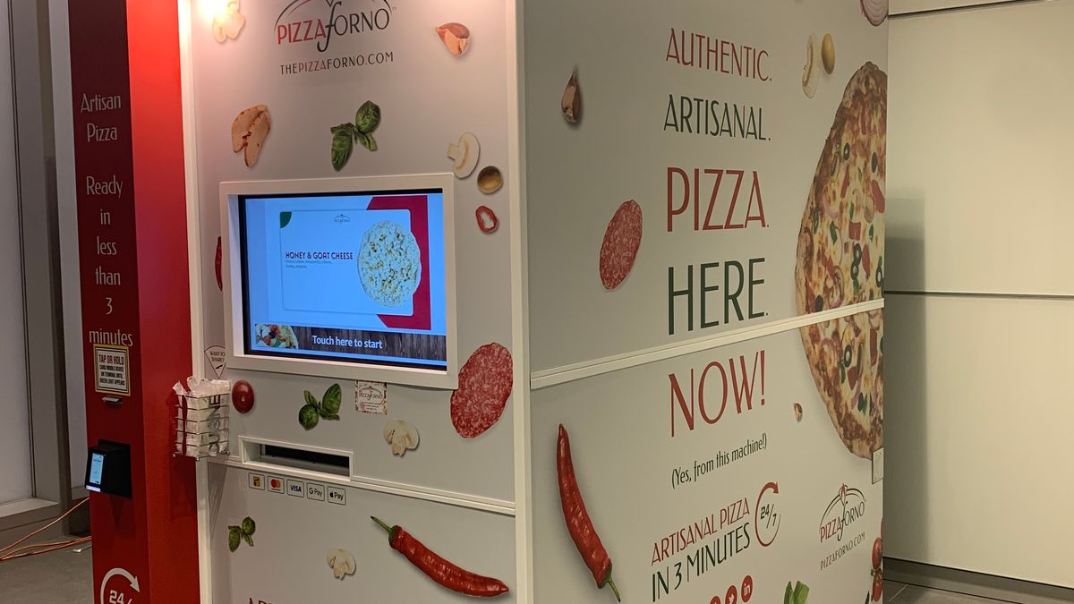 A PizzaForno indoor pizza vending machine located inside the CIBC Sqaure building in Toronto.