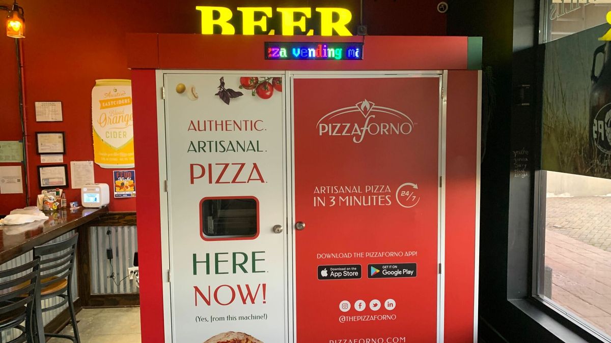 An indoor PizzaForno pizza vending machine that is located inside the Big Hops in San Antonio, Texas.