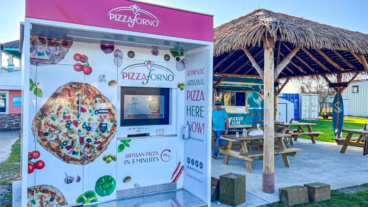 An automated pizza oven located in Crystal Beach. Its an outdoor PizzaForno machine beside a gazebo that serves pizza takeaway. 